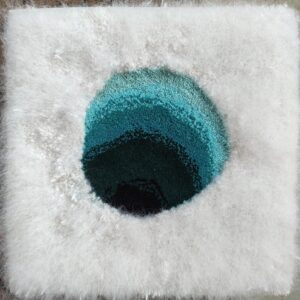 tapis pure laine trou dans glace handtufting